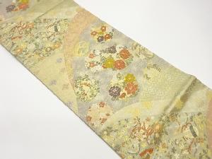 花輪に草花・楽器模様織出し袋帯